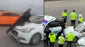 SÜRÜCÜ EĞİTMENİ TARTIŞTIĞI KİŞİYİ KAPUTTA 20 KM SÜREKLEDİ!