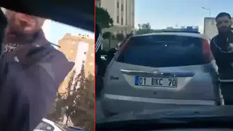 TRAFİKTE TARTIŞTIKLARI SÜRÜCÜNÜN ARACINI YUMRUKLADILAR!