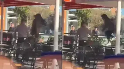 RESTORANDAKİ KAVGADA ÖFKELİ KADIN MASADAN MASAYA ATLADI!