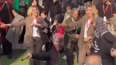 BAŞÖRTÜLÜ KADININ ELİNİ TUTMADIĞI İDDİALARINA SERT YANIT VERDİ!