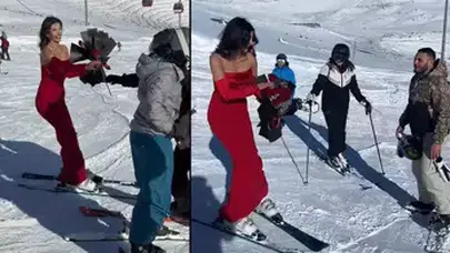 KIRMIZI ELBİSE İLE KAYAK YAPTI VE GÜL DAĞITTI!