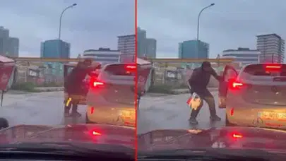 TRAFİKTE TARTIŞIĞI KİŞİYİ KOLUNDAN TUTARAK İNDİRMEK İSTEDİ!