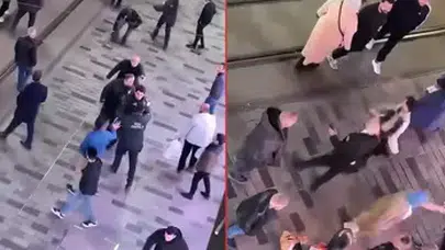 İSTİKLAL CADDESİ'NDE TEKME VE YUMRUKLU KAVGA KAMERADA!